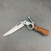 Versatile Tactical Knife with Stainless Steel Blade - Ergonomic Handle, Quick-Deploy Thumb Holes for Ambidextrous Use